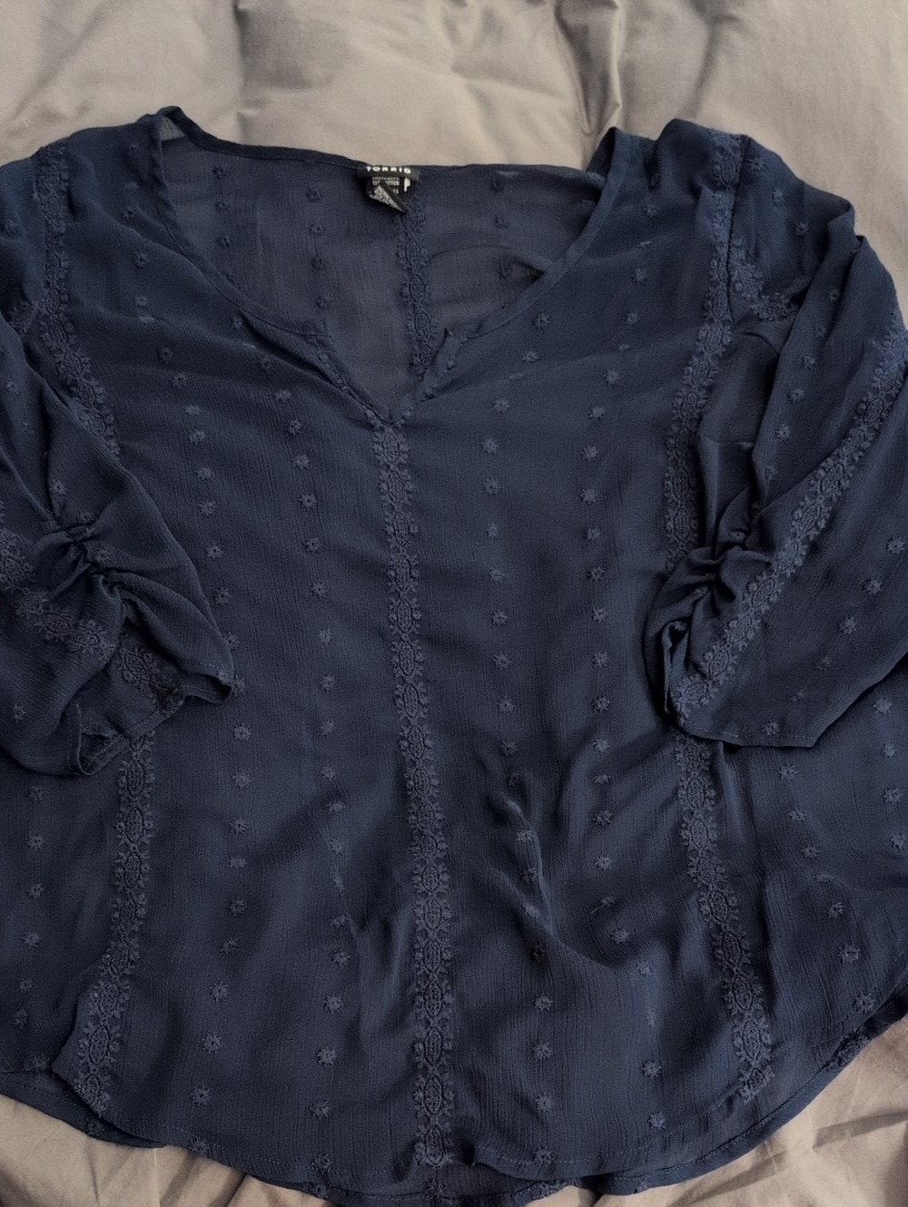 Torrid brand navy blue chiffon blouse featuring Swiss dot fabric and crochet lac
